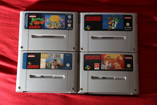 hry pro SNES: Lemmings, Super Mario World, Sim City 2000, Lion King